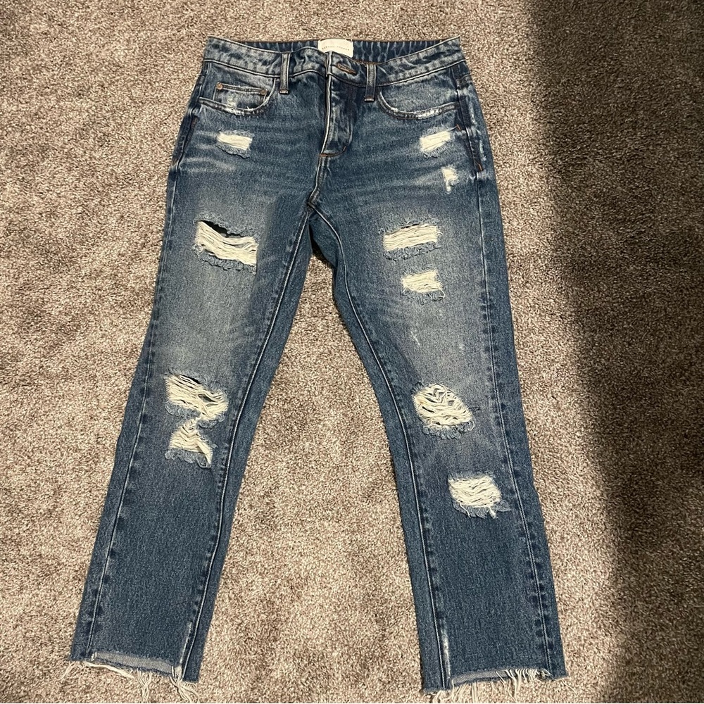 Ripped high rise ankle length jeans